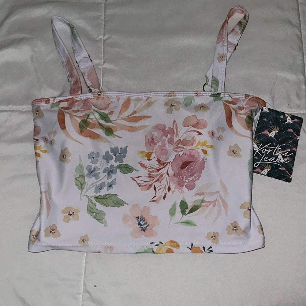 Kortni Jeane latter back